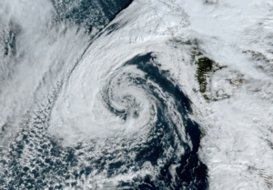 Low pressure center spins off the coast