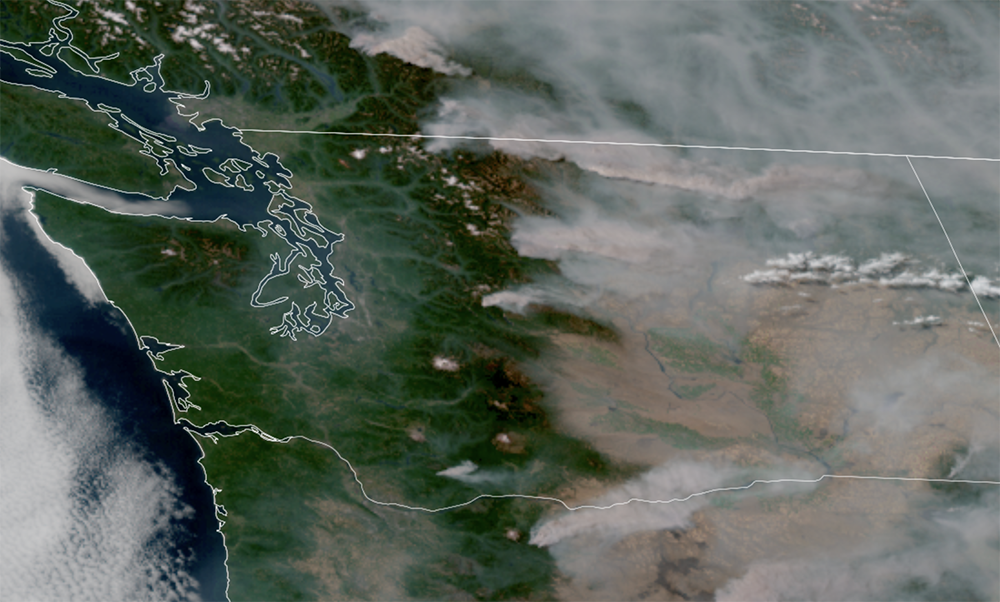 GOES-18 satellite image of the heavy smoke across Eastern Washington and lighter smoke on the west side on Aug. 6, 2026. (NOAA / CIRA / RAAM-B)